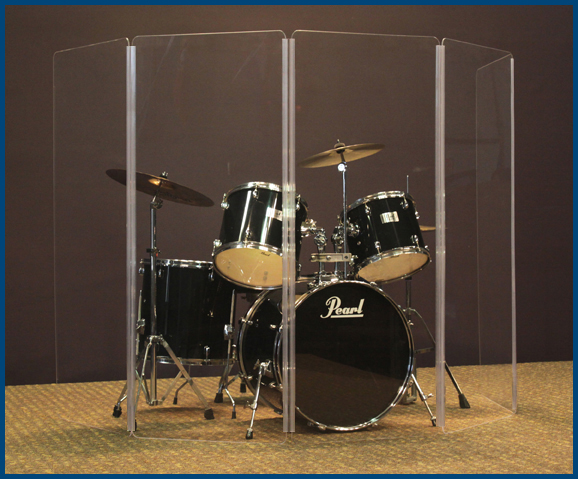 Drum shield around a drum set.